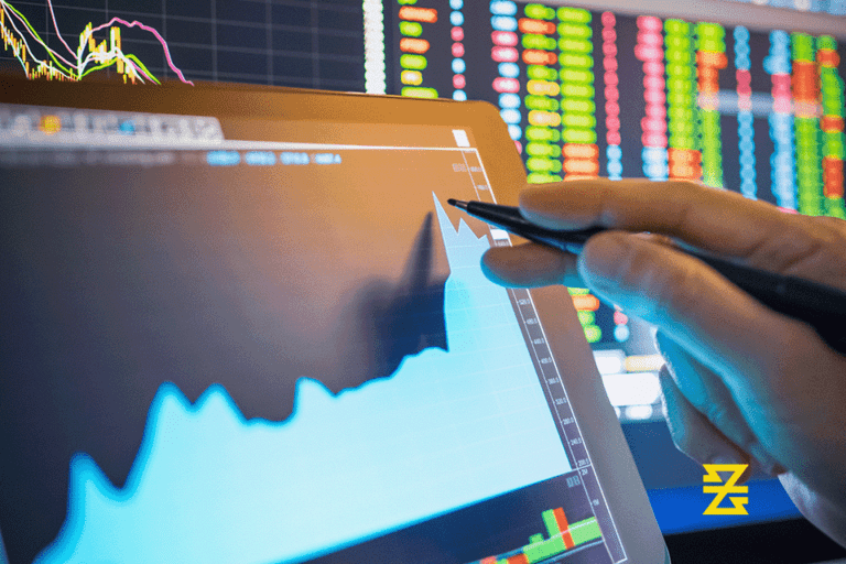 Retail investor reviewing forex market on trading platform with graph