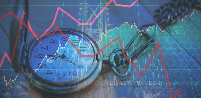 Pocket watch referencing 24 hours a day over foreign exchange currency market graph for currency trading.